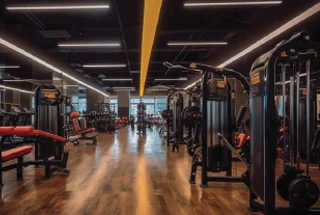 Modern gym at Delta Palm Beach residential project Seawoods